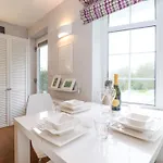 בית נופש T'whit T'woo ווינדרמר